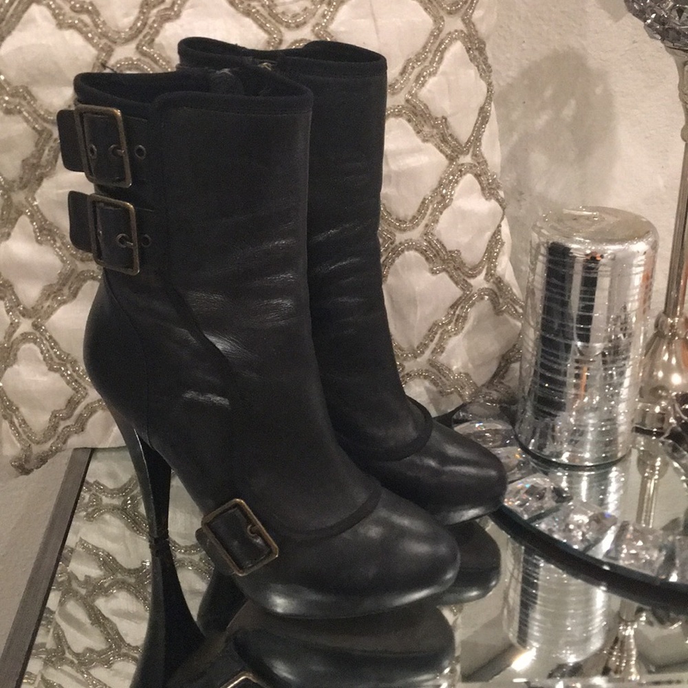 Buckled leather boots